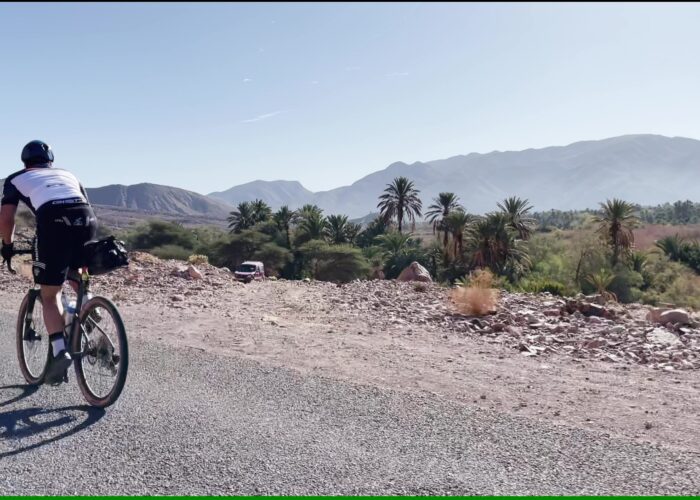 Cycling the atlas mountains and enjoying a breathtaking panoramic view from a summit in the Atlas Mountains, Morocco