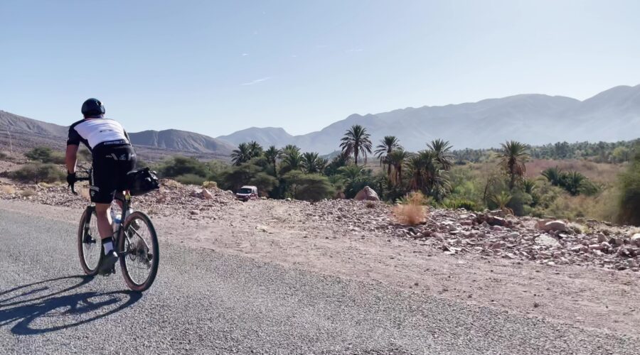 Cycling the atlas mountains and enjoying a breathtaking panoramic view from a summit in the Atlas Mountains, Morocco